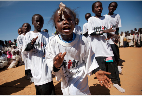 Young girls in an Internally displaced persons camp in North Darfur perform traditional Darfuri dances and songs at an event organized by UNAMID.