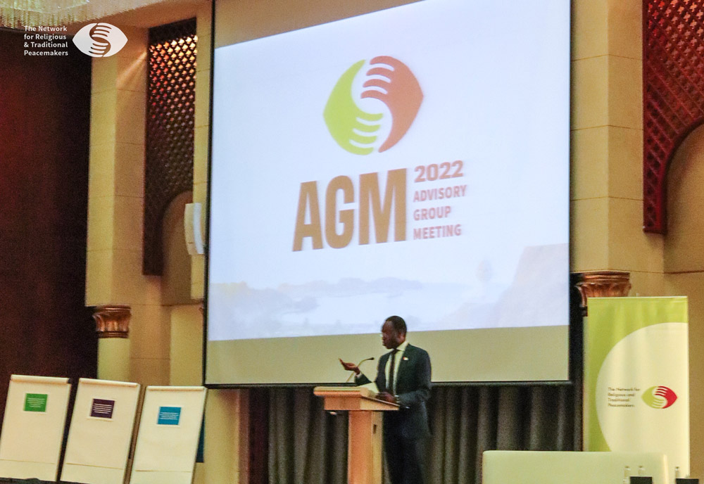 Man delivering a speech in official meeting